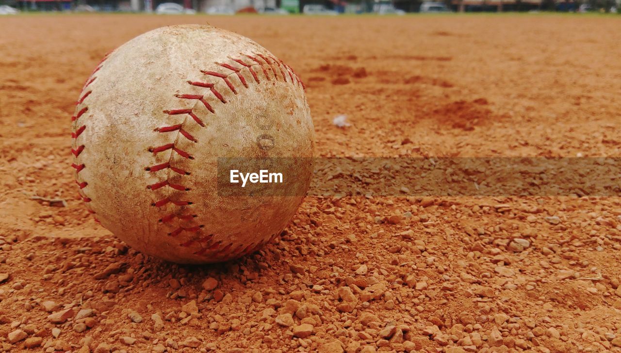 Close-up of baseball on field