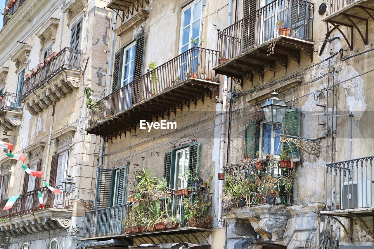 LOW ANGLE VIEW OF RESIDENTIAL BUILDINGS