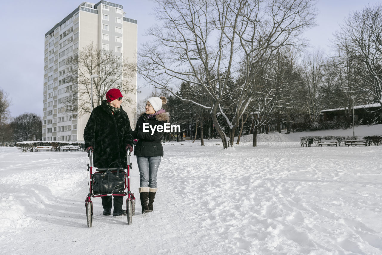 Women having walk at winter