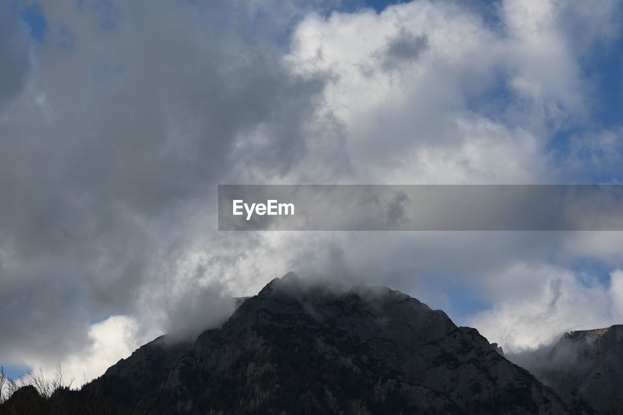 cloud, mountain, sky, environment, beauty in nature, mountain range, scenics - nature, landscape, nature, mountain peak, no people, travel destinations, travel, outdoors, land, tourism, cloudscape, non-urban scene, fog, dramatic sky, ridge, day, rock