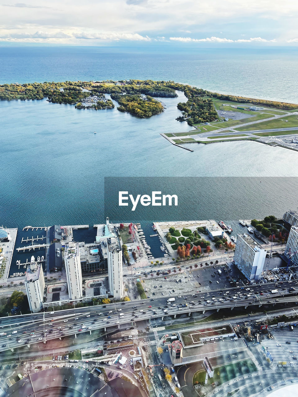 water, aerial photography, architecture, city, sea, built structure, building exterior, high angle view, aerial view, nature, sky, coast, travel destinations, building, cityscape, marina, no people, day, transportation, cloud, travel, bird's-eye view, outdoors, dock, landscape, environment, beach, scenics - nature, land, bay, tourism, urban skyline, residential district, coastline, port, skyscraper