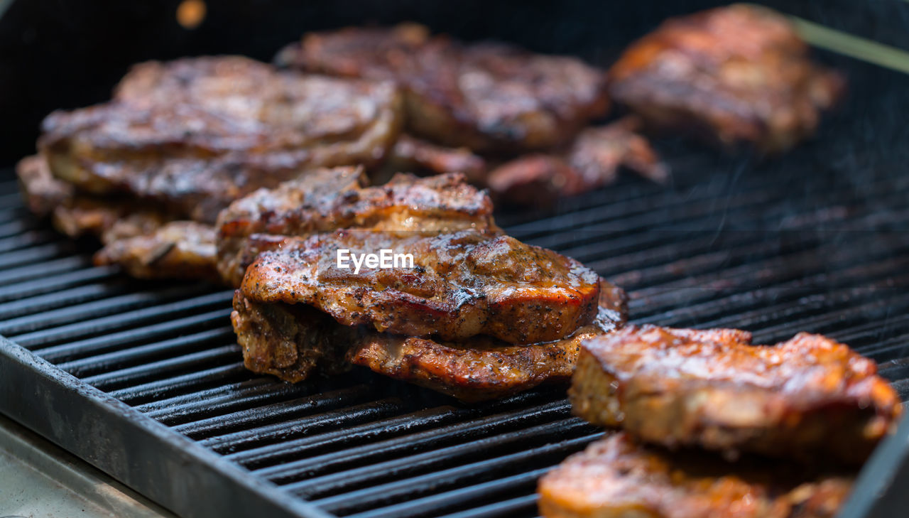 Close-up of meat on barbecue grill