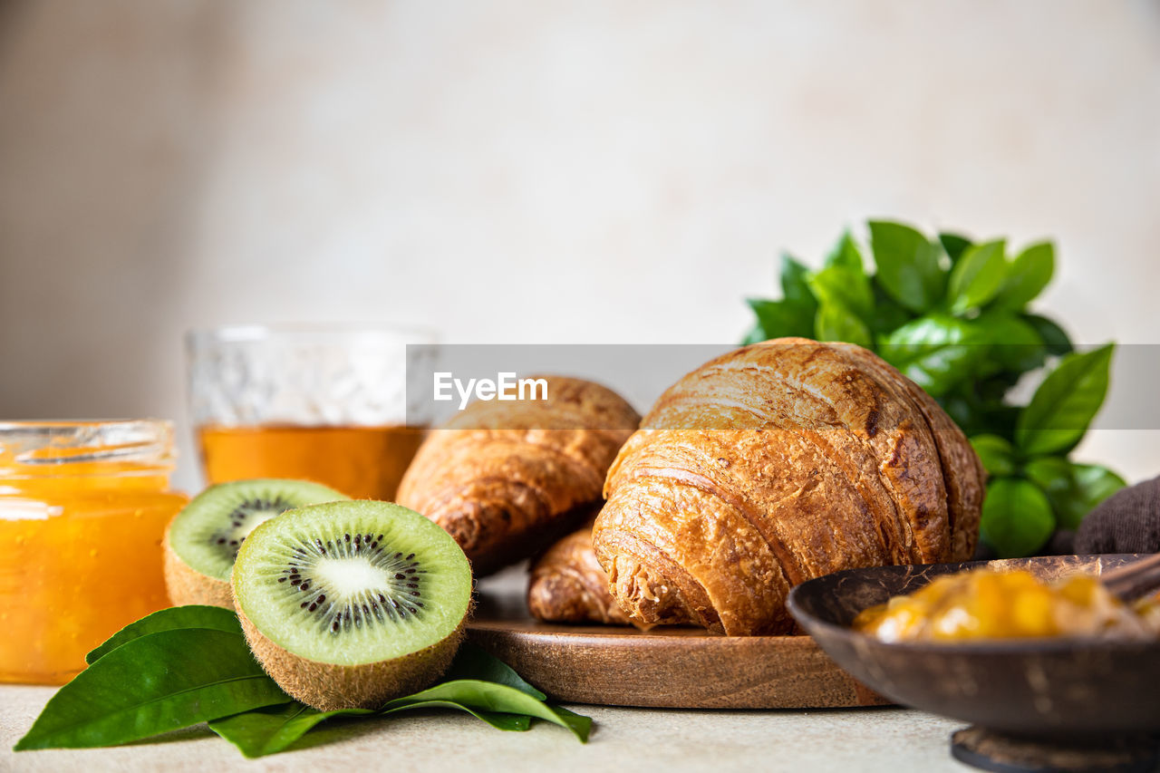 CLOSE-UP OF FRESH BREAKFAST ON TABLE