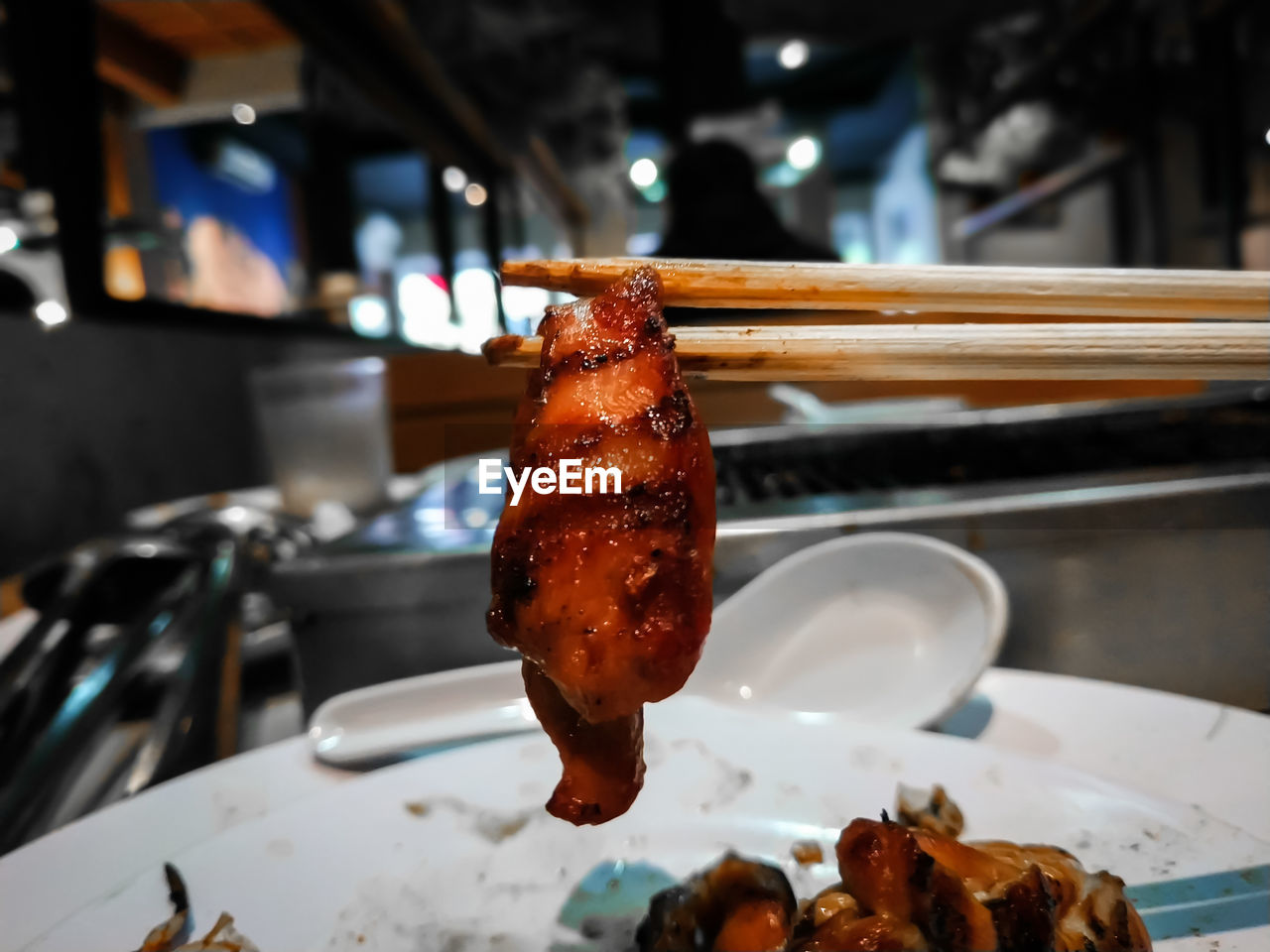 CLOSE-UP OF ICE CREAM ON BARBECUE GRILL