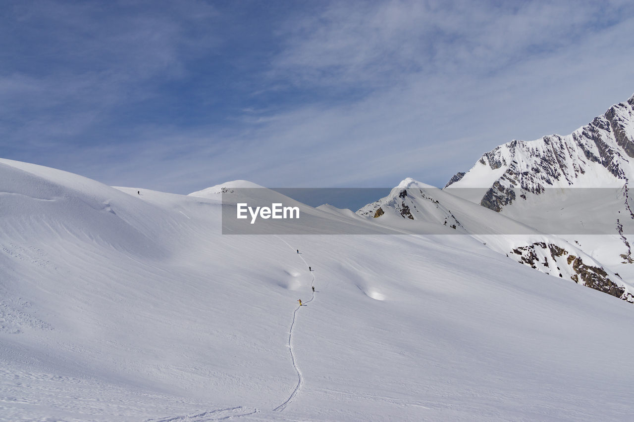 Snowcapped mountains against sky