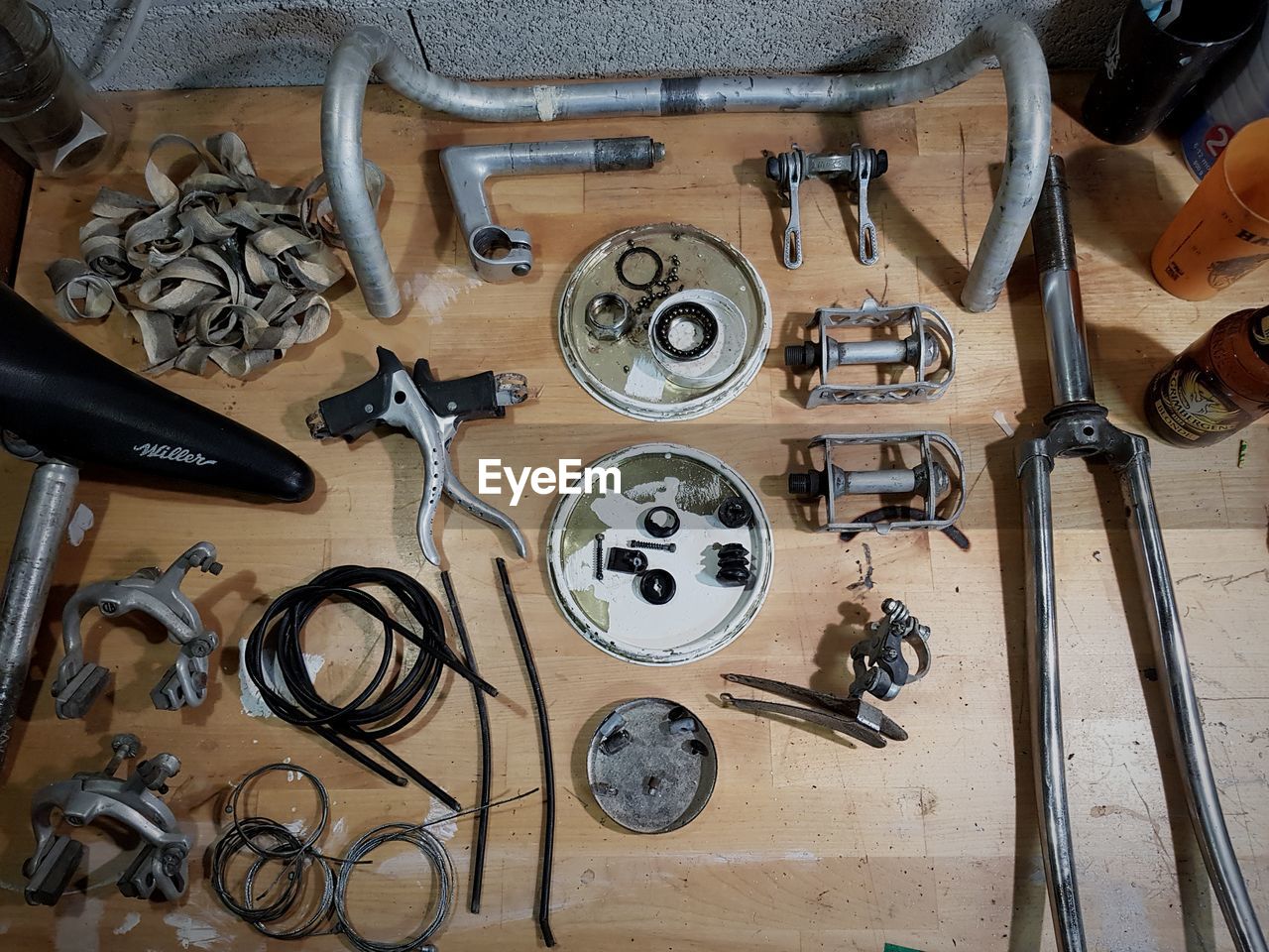 HIGH ANGLE VIEW OF VARIOUS EQUIPMENT ON TABLE AT HOME