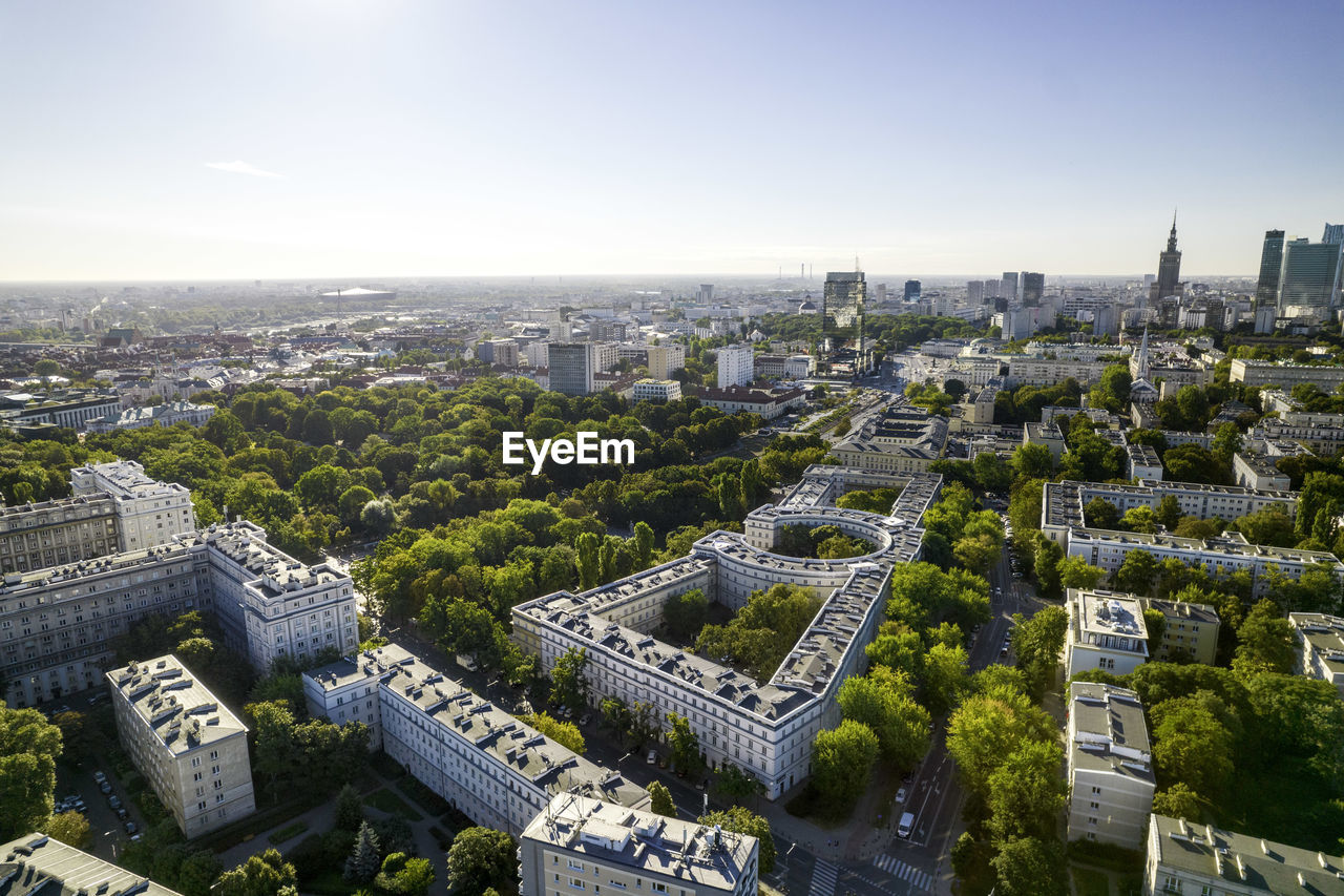 Beautiful panoramic drone view of the centre of modern warsaw with silhouettes of skyscrapers. 