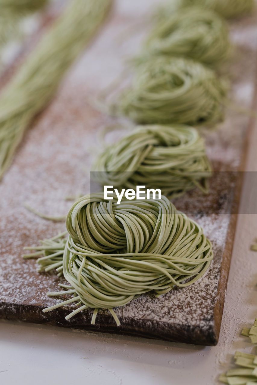 High angle view of pasta on cutting board