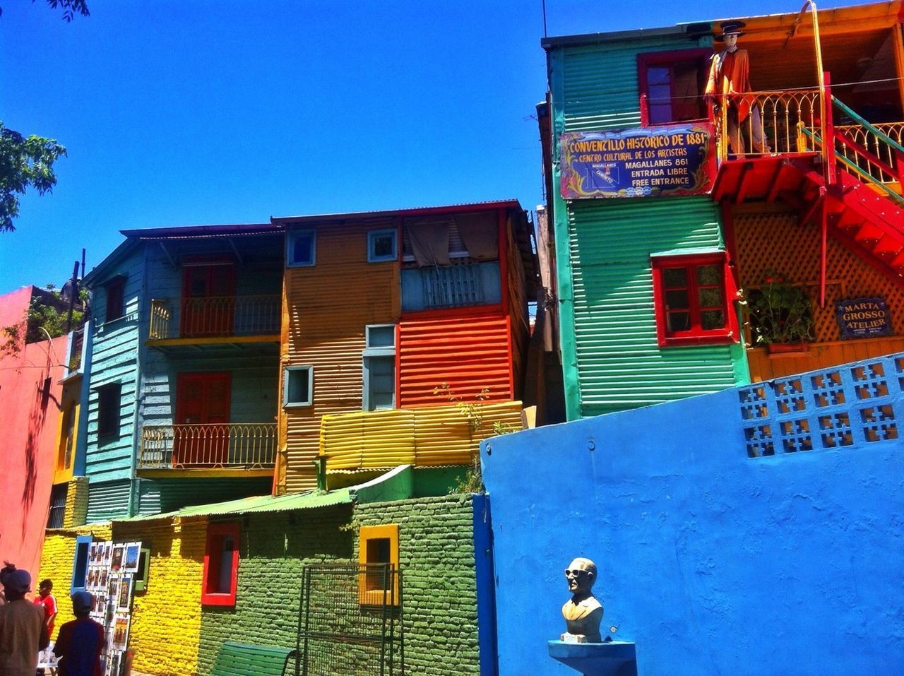 Low angle view of multi colored building against clear sky