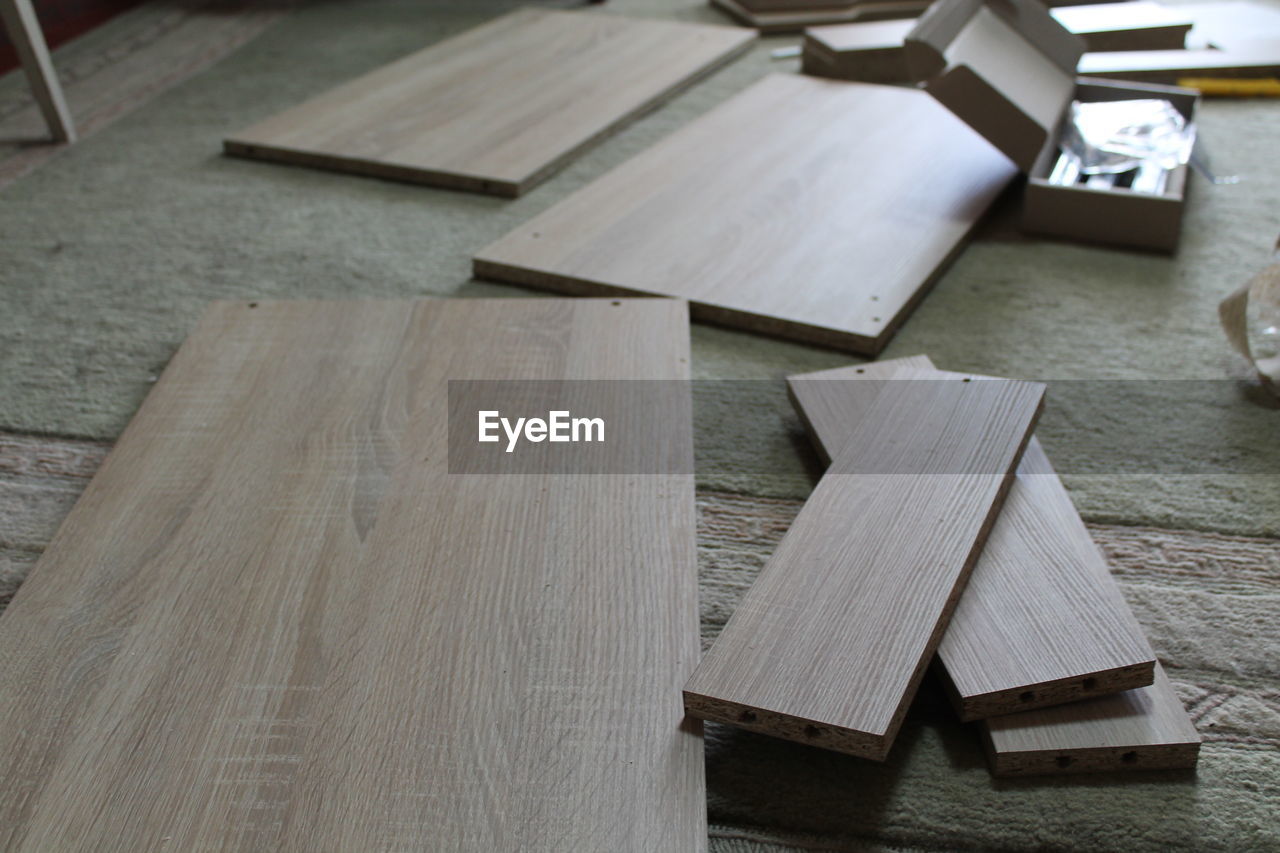 wood, floor, indoors, flooring, table, hardwood, furniture, plywood, high angle view, art, no people, business finance and industry, workshop, occupation, craft, industry, business, diy