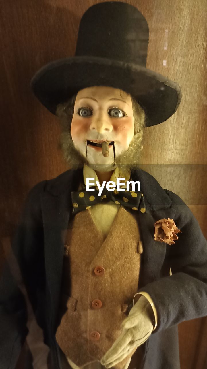 clothing, hat, portrait, one person, costume, indoors, celebration, looking at camera, adult, halloween, person, front view, waist up, men, gold, spooky, human representation, fear, facial hair, dressing up