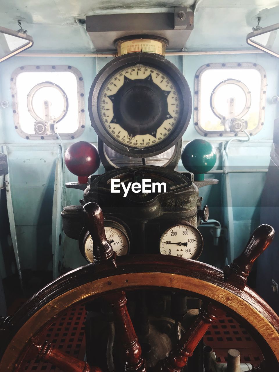 Close-up of steering wheel in boat