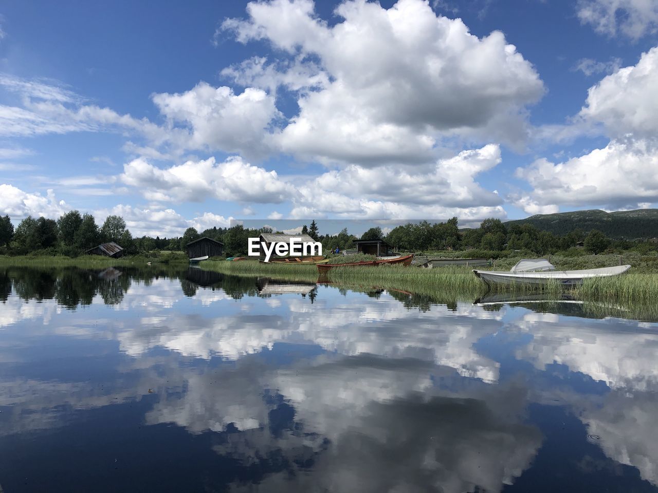 REFLECTION OF CLOUDS IN LAKE