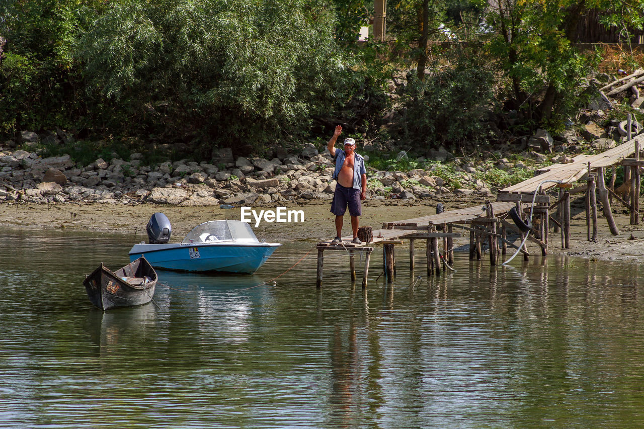 PEOPLE ENJOYING IN BOAT