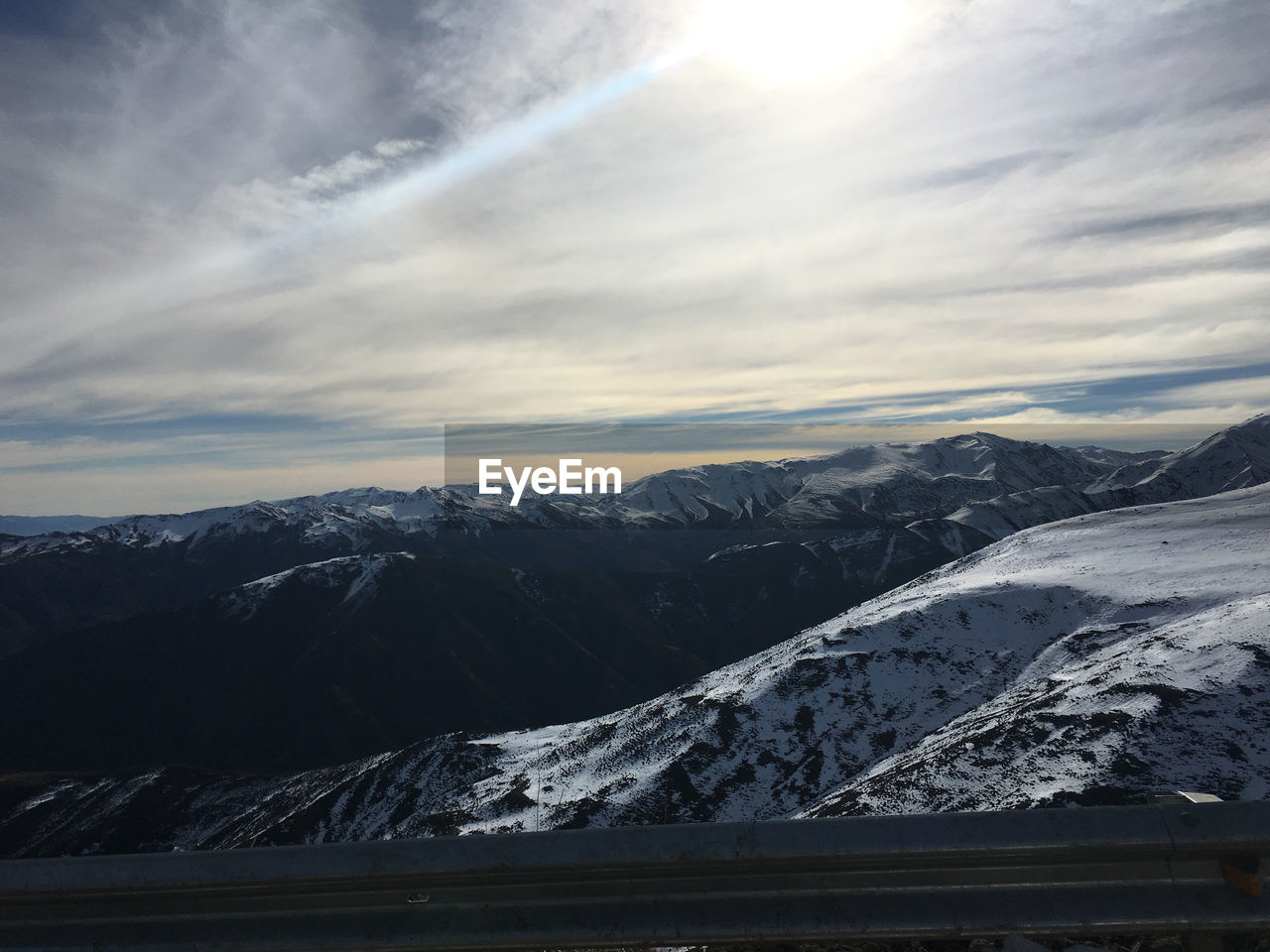 HIGH ANGLE VIEW OF SNOWCAPPED MOUNTAINS