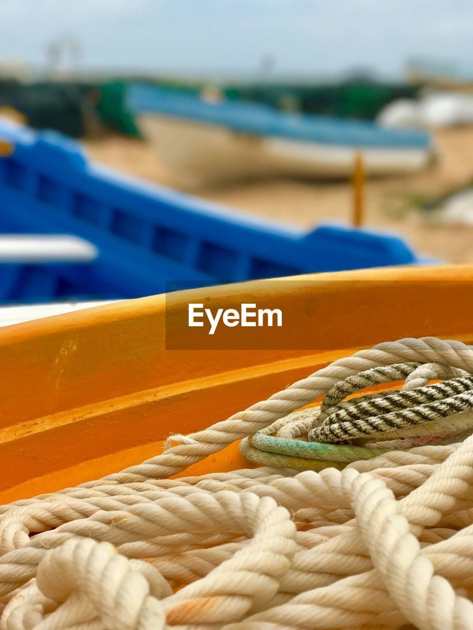 BOATS MOORED IN HARBOR