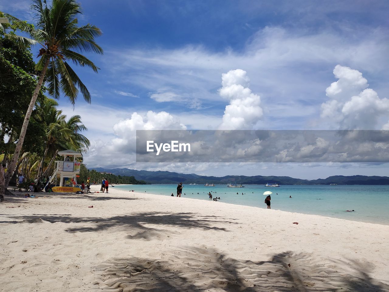 VIEW OF PEOPLE ON BEACH