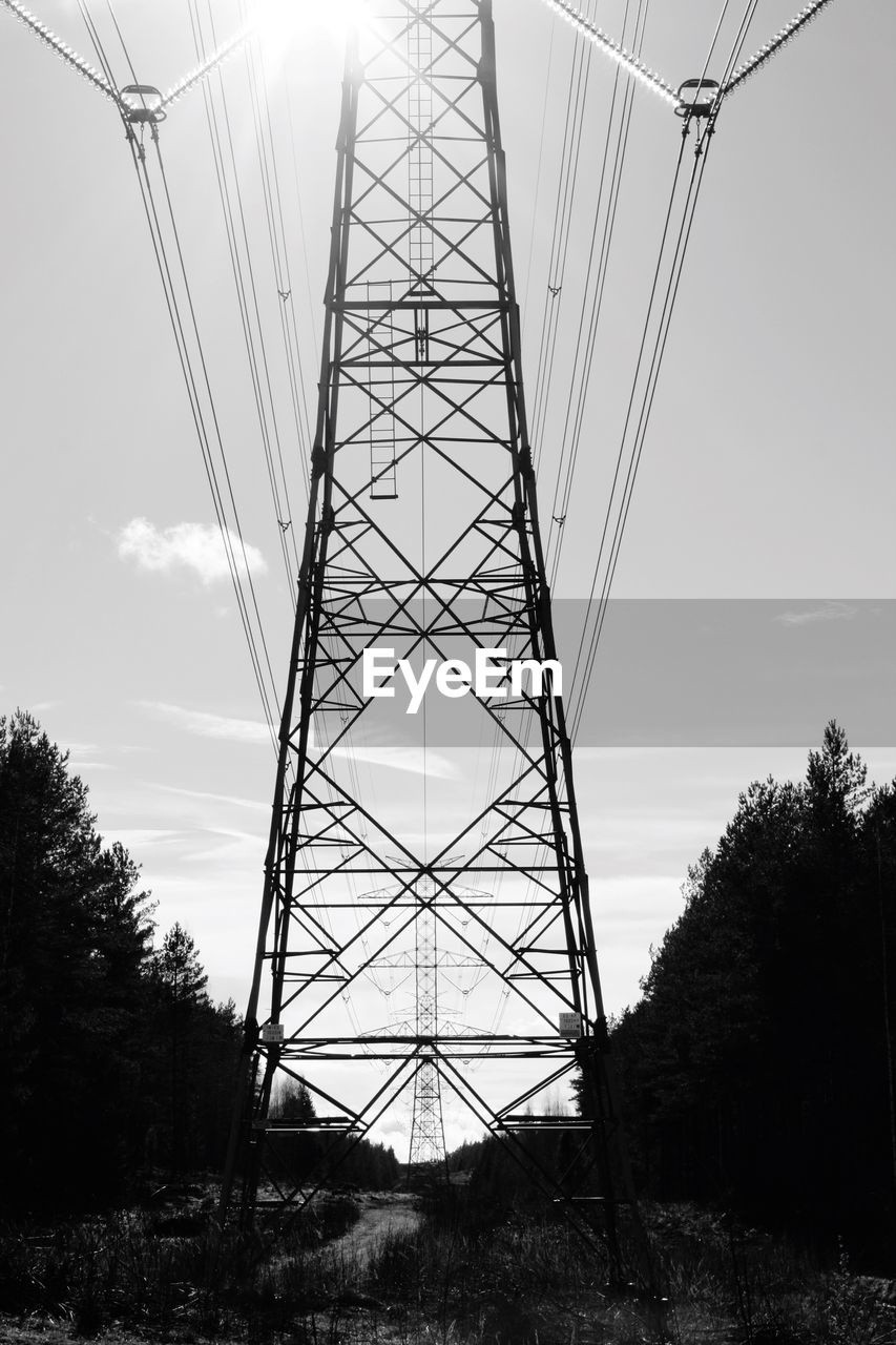 LOW ANGLE VIEW OF ELECTRICITY PYLON