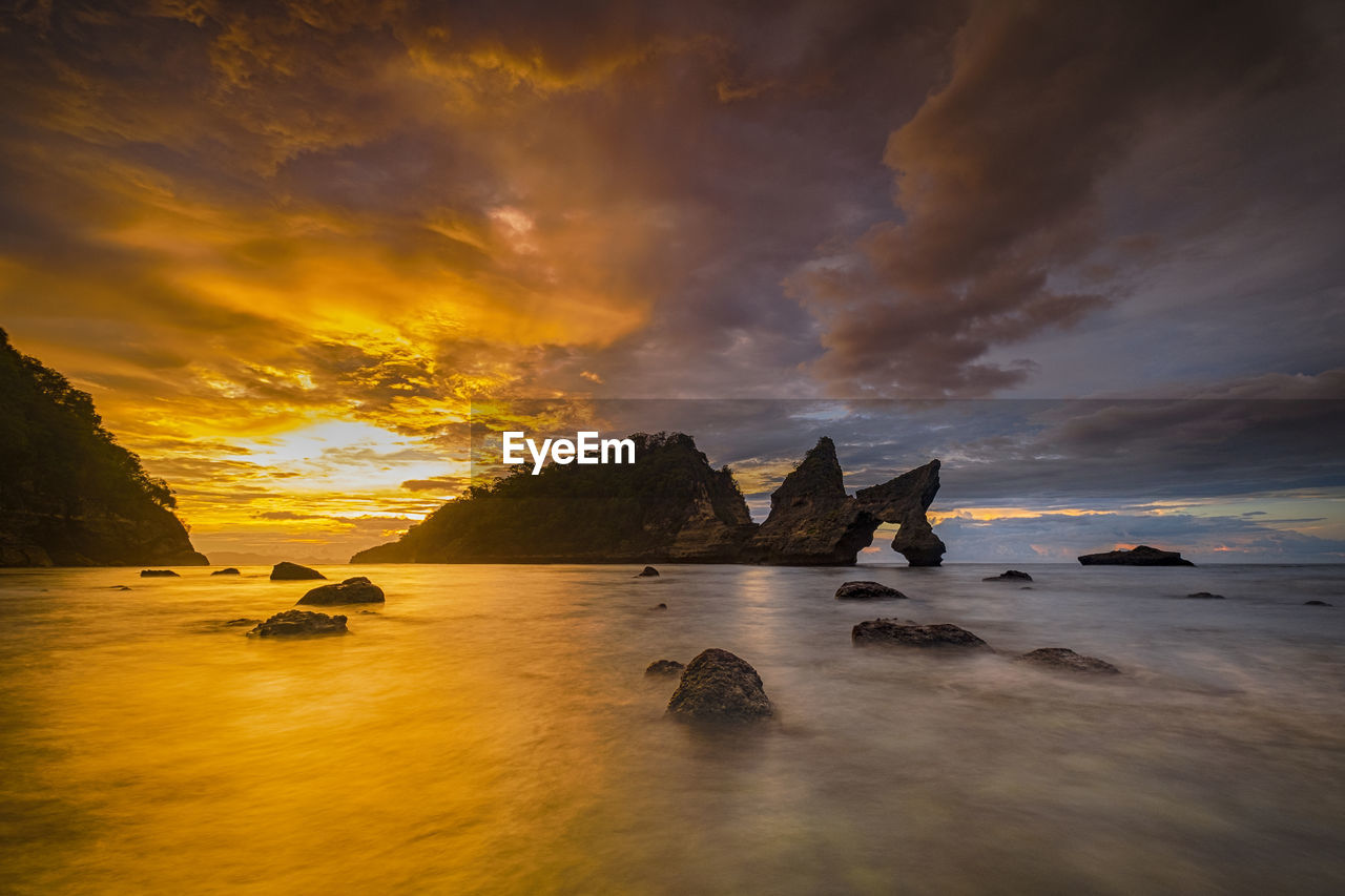 Scenic view of sea against sky during sunset