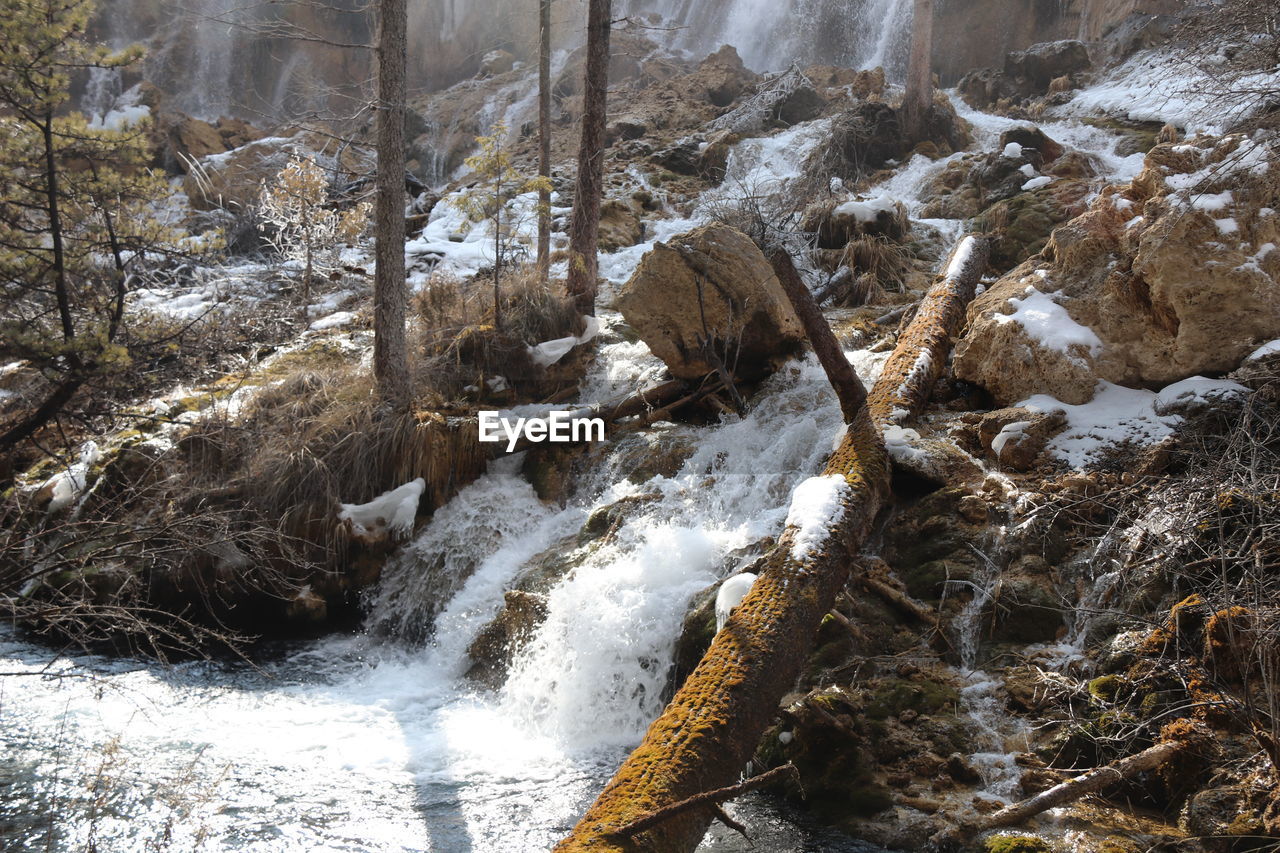 Beautiful view of waterfall in jiuzhaigou national park in china, the heaven on the earth with snow