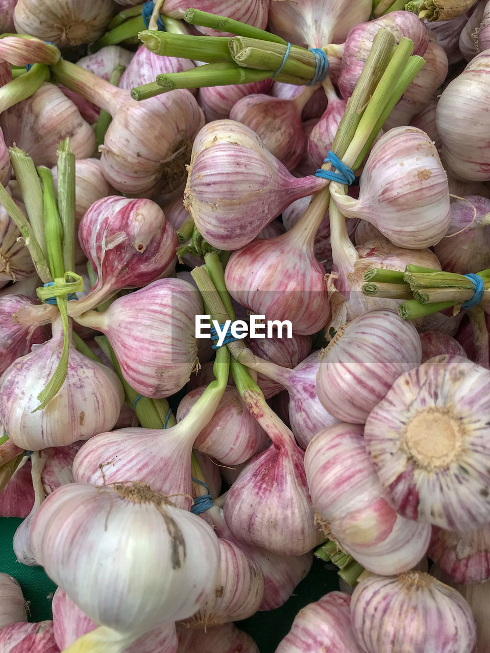 Full frame shot of garlic for sale at market stall