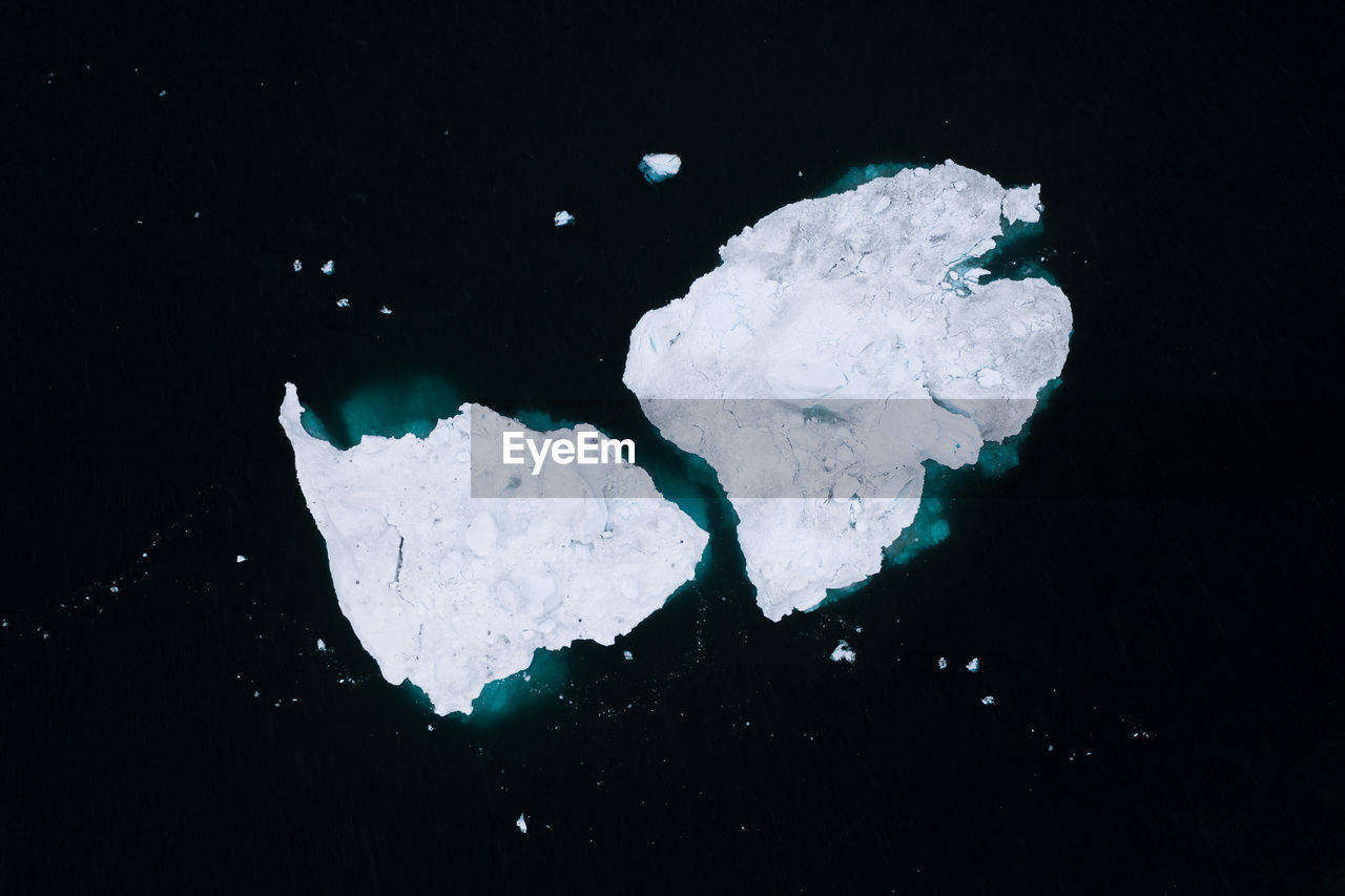 High angle view of glaciers in sea