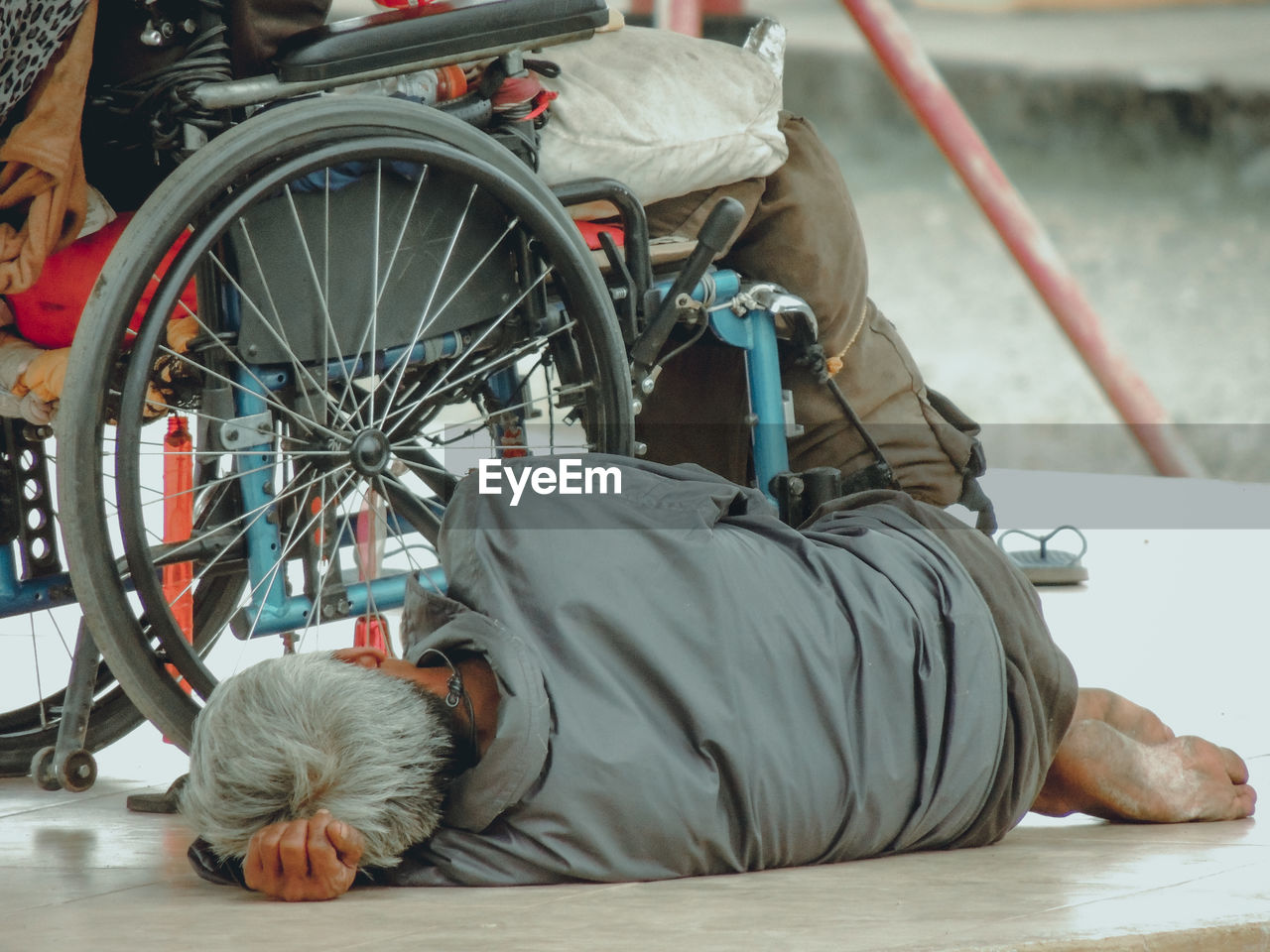 Man sleeping on cart