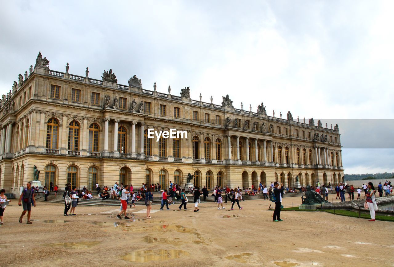 People in front of versailles castle