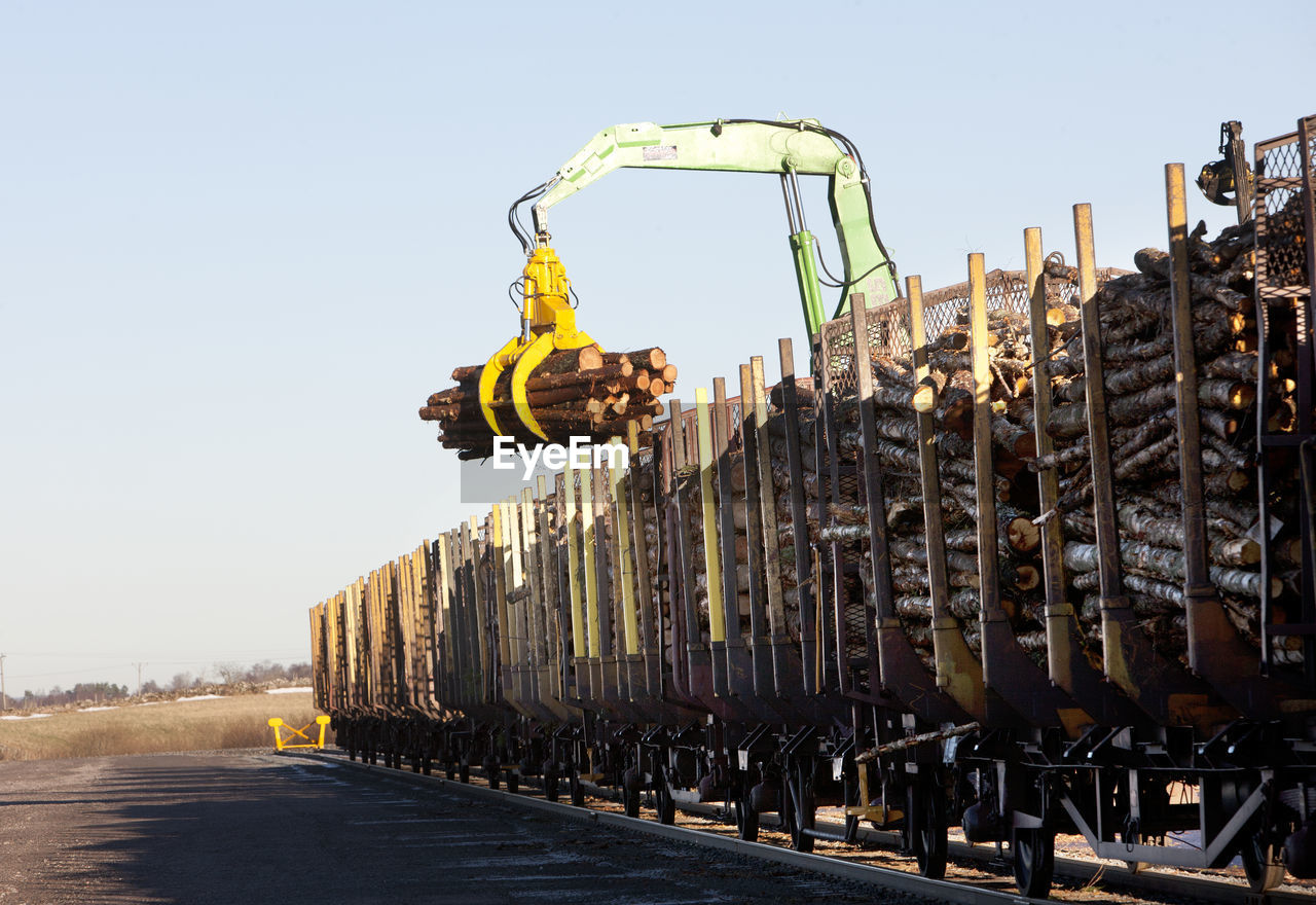 Logging vehicle loading timber