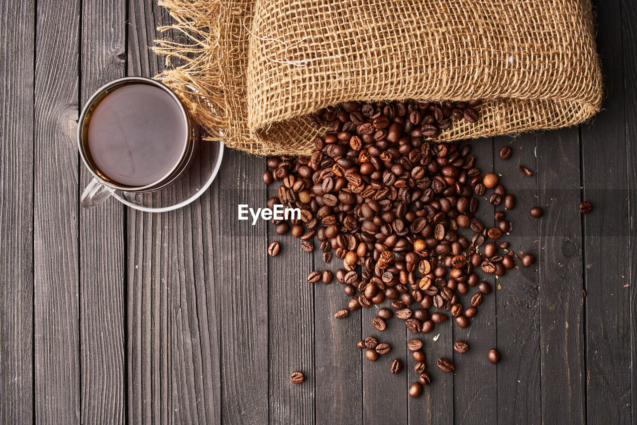 food and drink, food, wood, coffee, brown, freshness, roasted coffee bean, table, healthy eating, drink, rustic, seed, directly above, still life, no people, wellbeing, indoors, burlap, refreshment, ingredient, spice, studio shot, large group of objects, high angle view, cup, crop, agriculture, scented, copy space, container