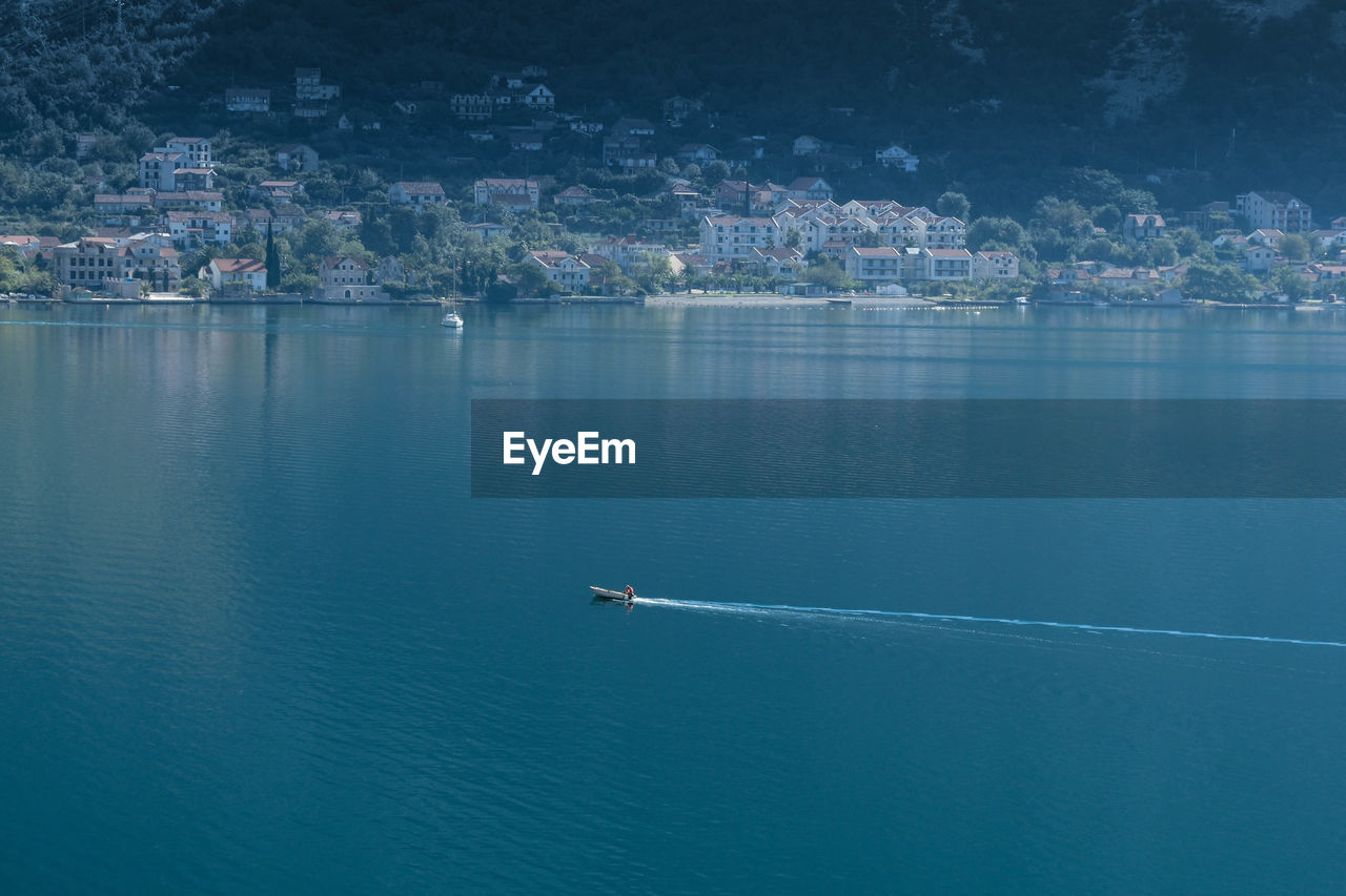 Scenic view of jet boat on lake