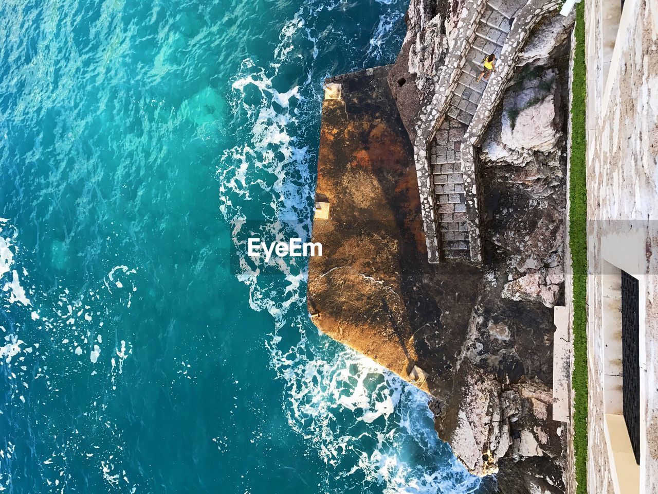 High angle view of sea against blue sky