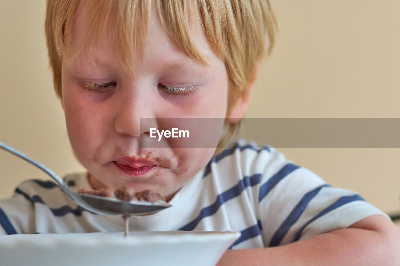 Portrait of cute boy with ice cream