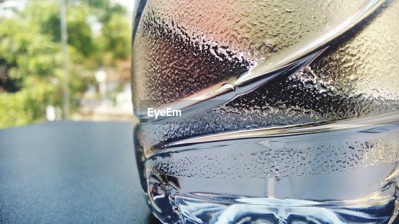 Close-up of water in glass container on table