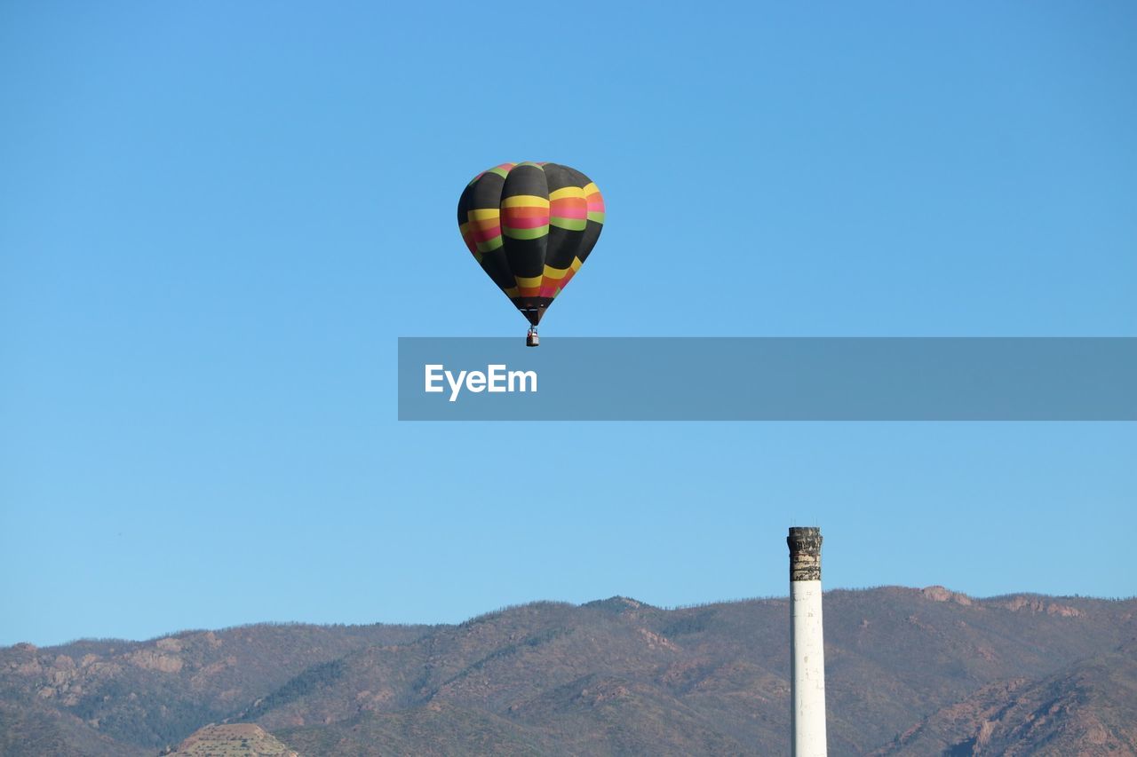 HOT AIR BALLOON FLYING IN SKY