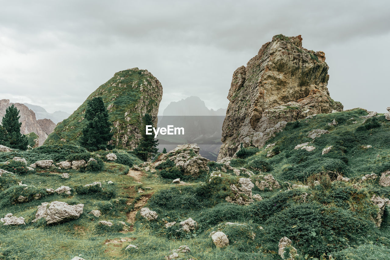 Scenic view of rocky mountains against sky