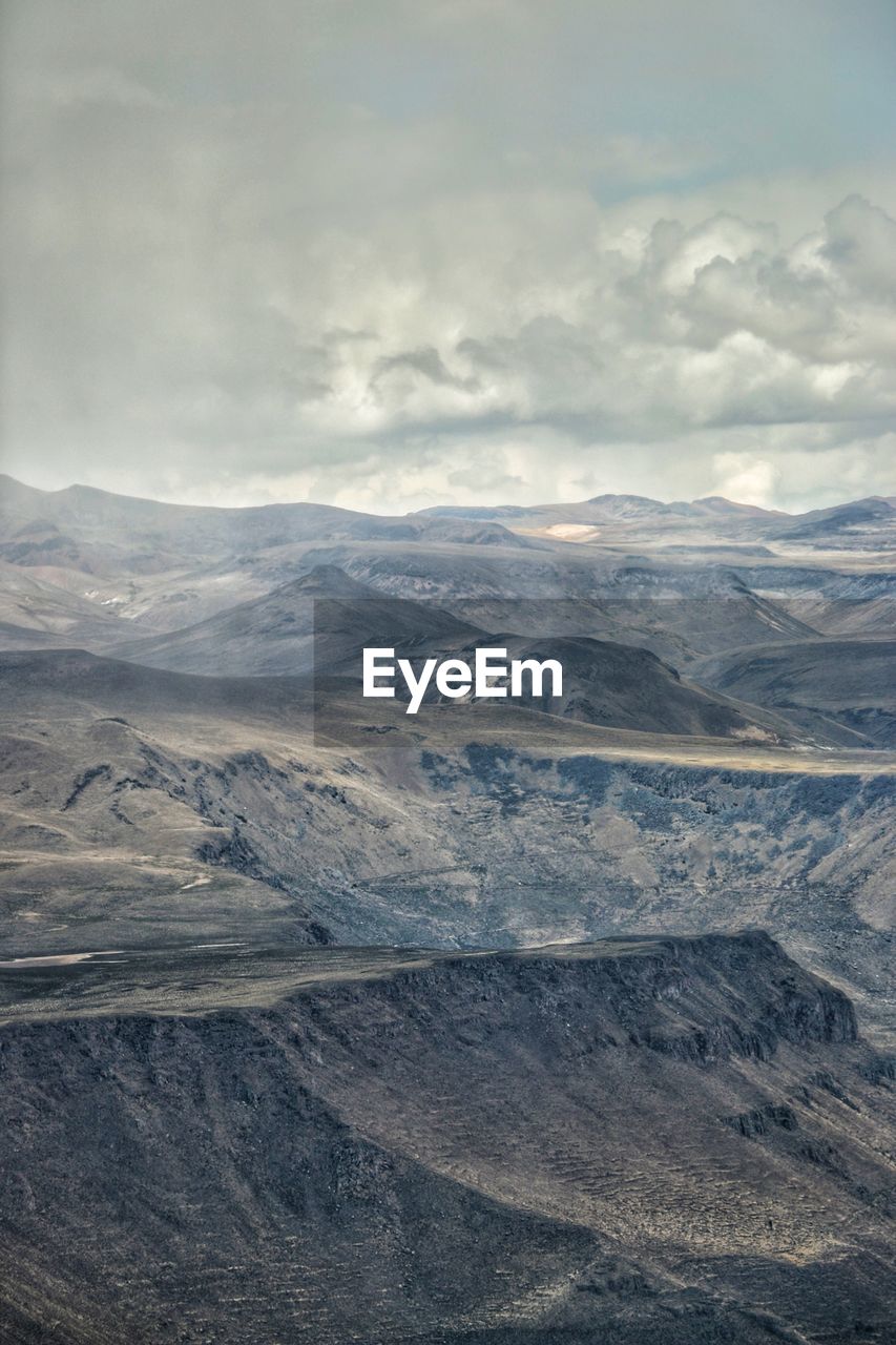 Scenic view of dramatic landscape against sky