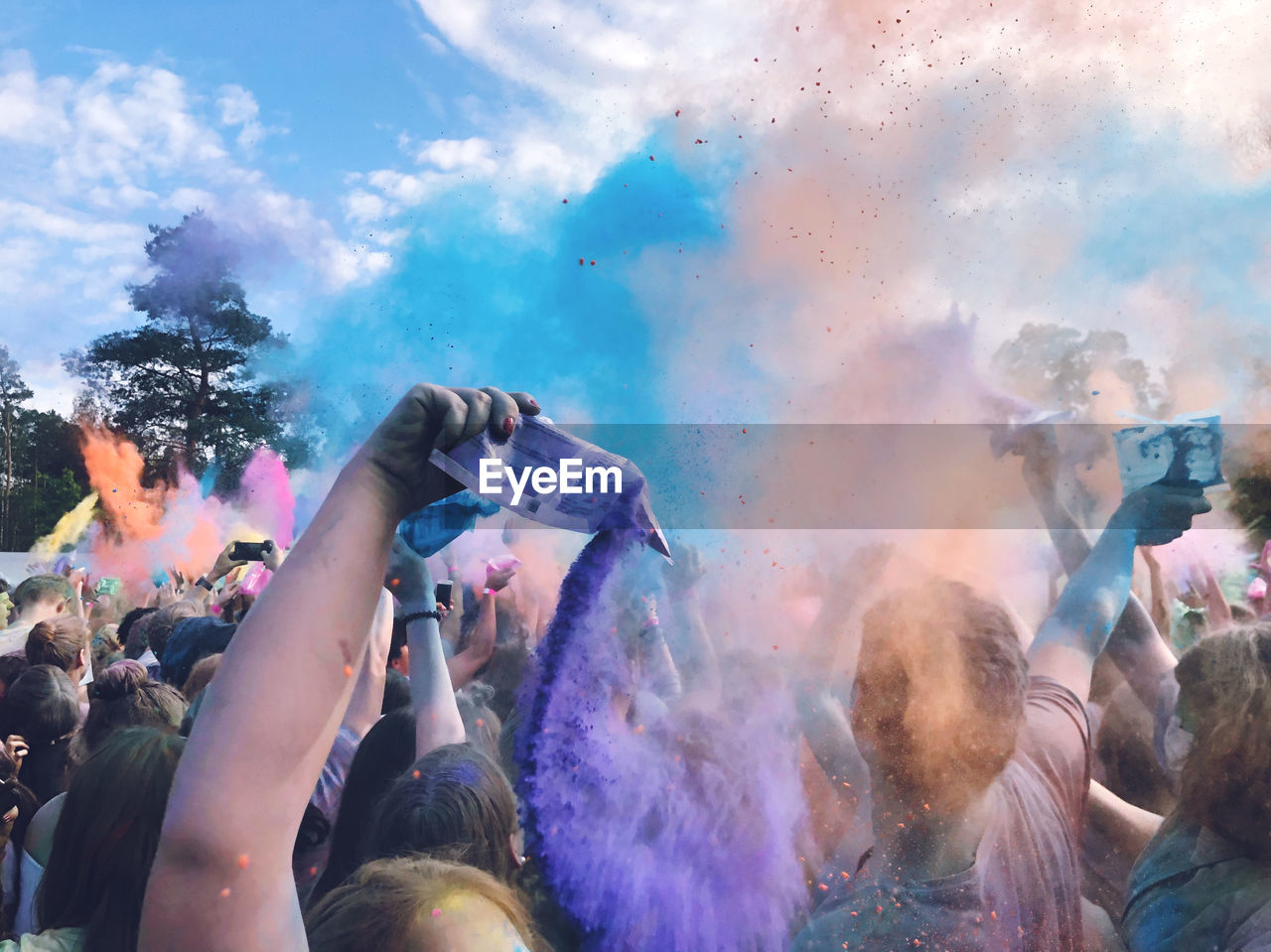 Group of people enjoying holi