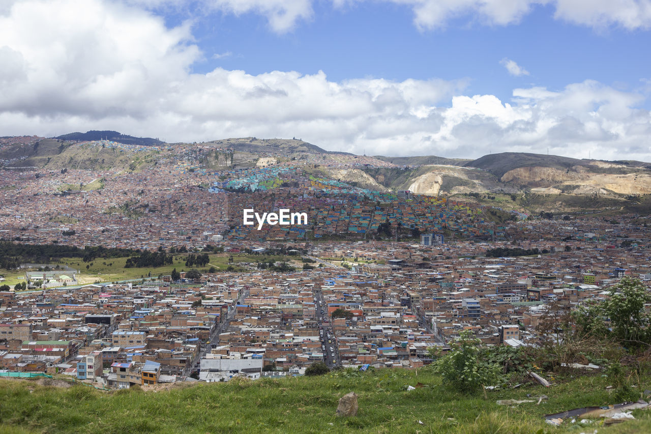 Aerial view of townscape against sky