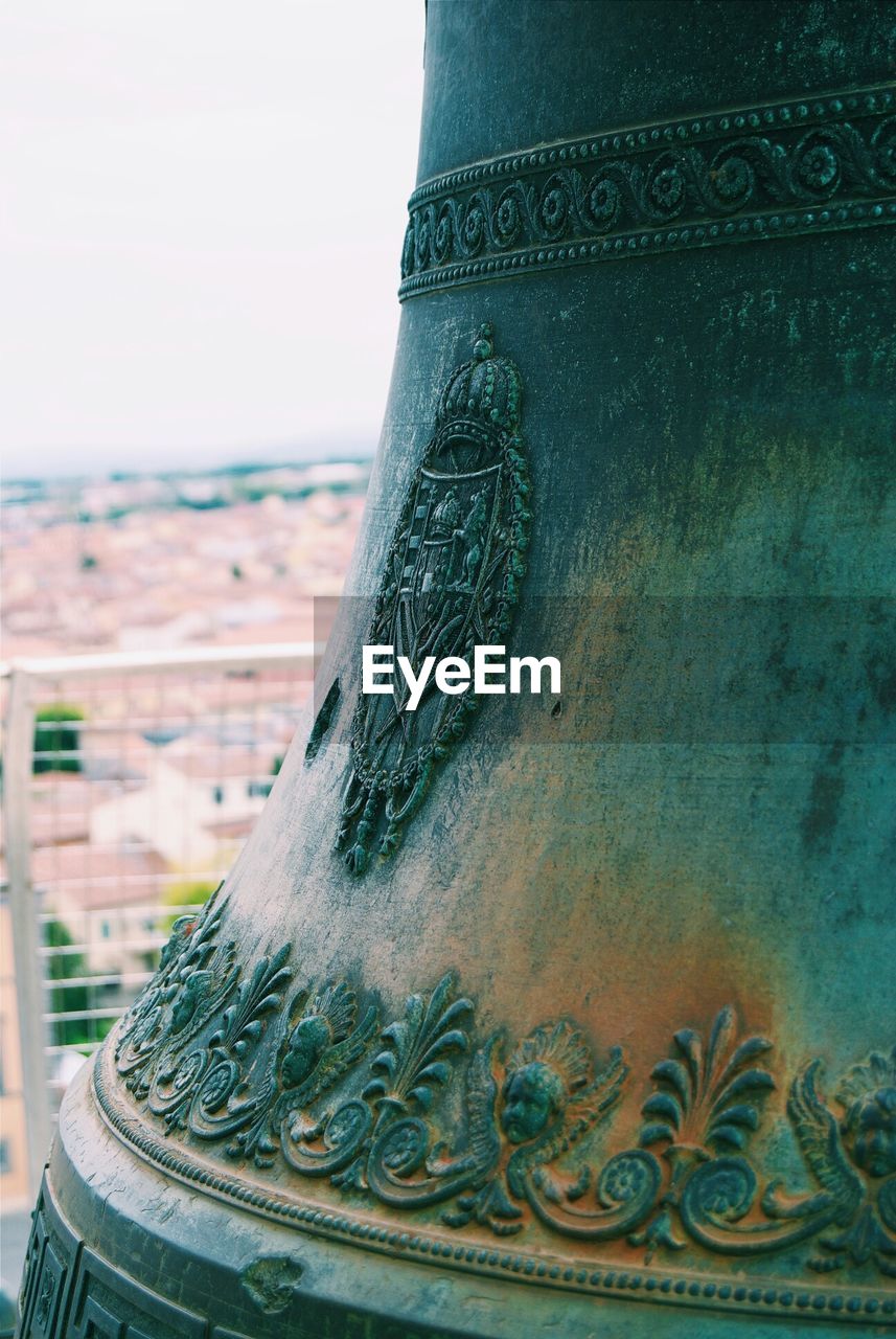 Carvings on bell of leaning tower of pisa