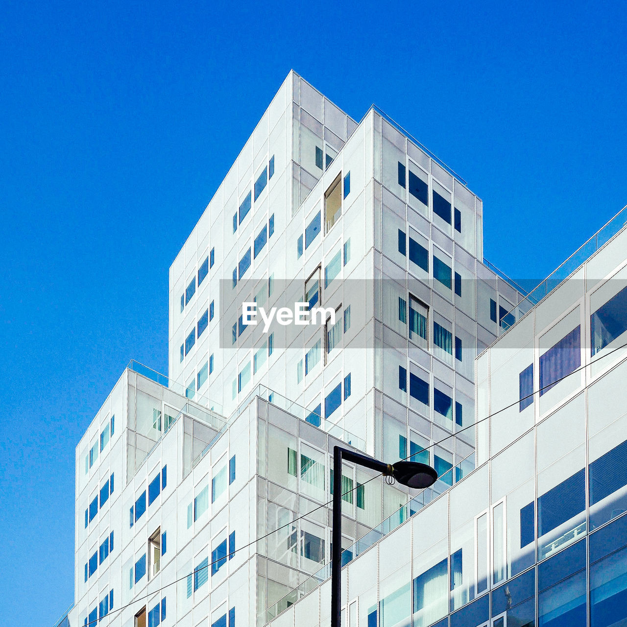 Low angle view of building against blue sky