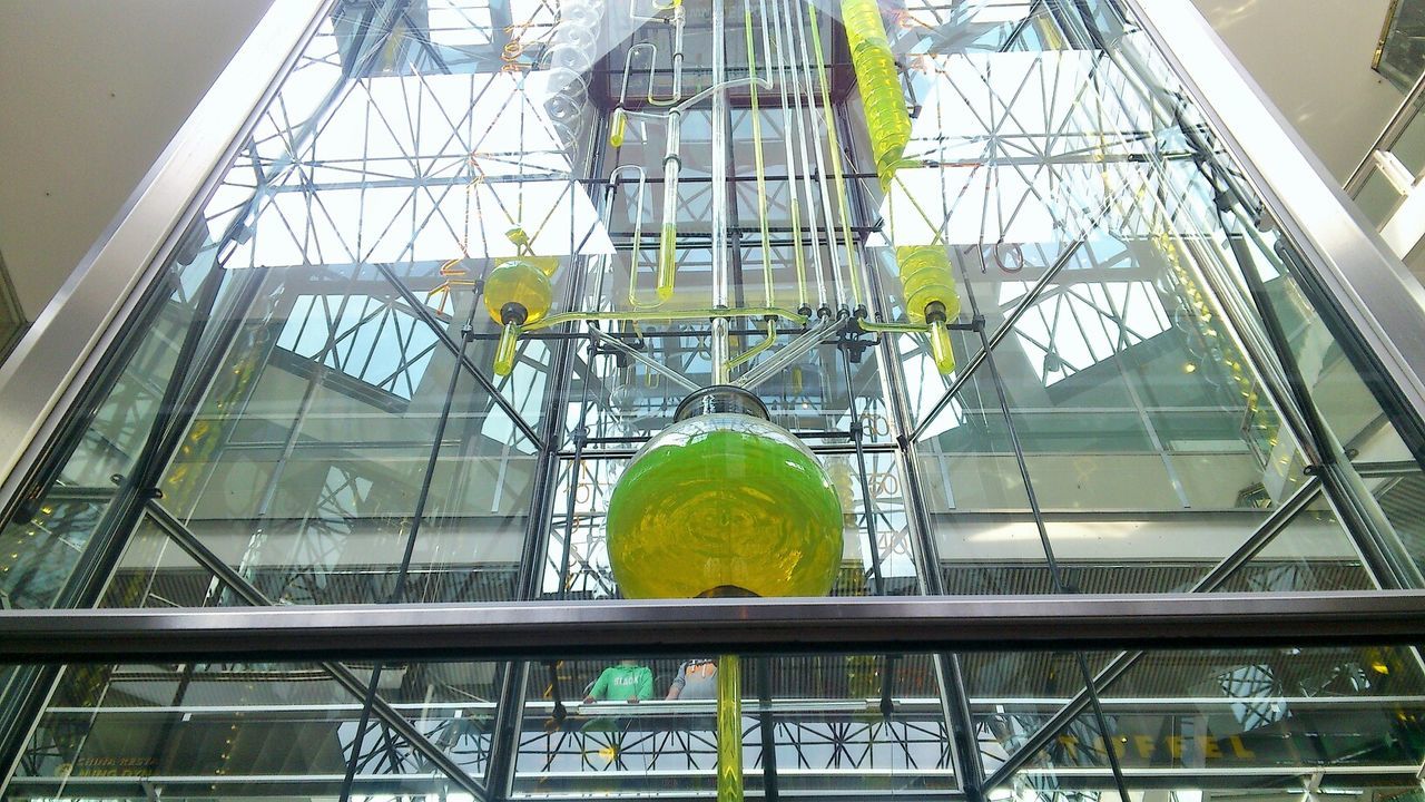 Complex design of led lights mounted in modern building atrium