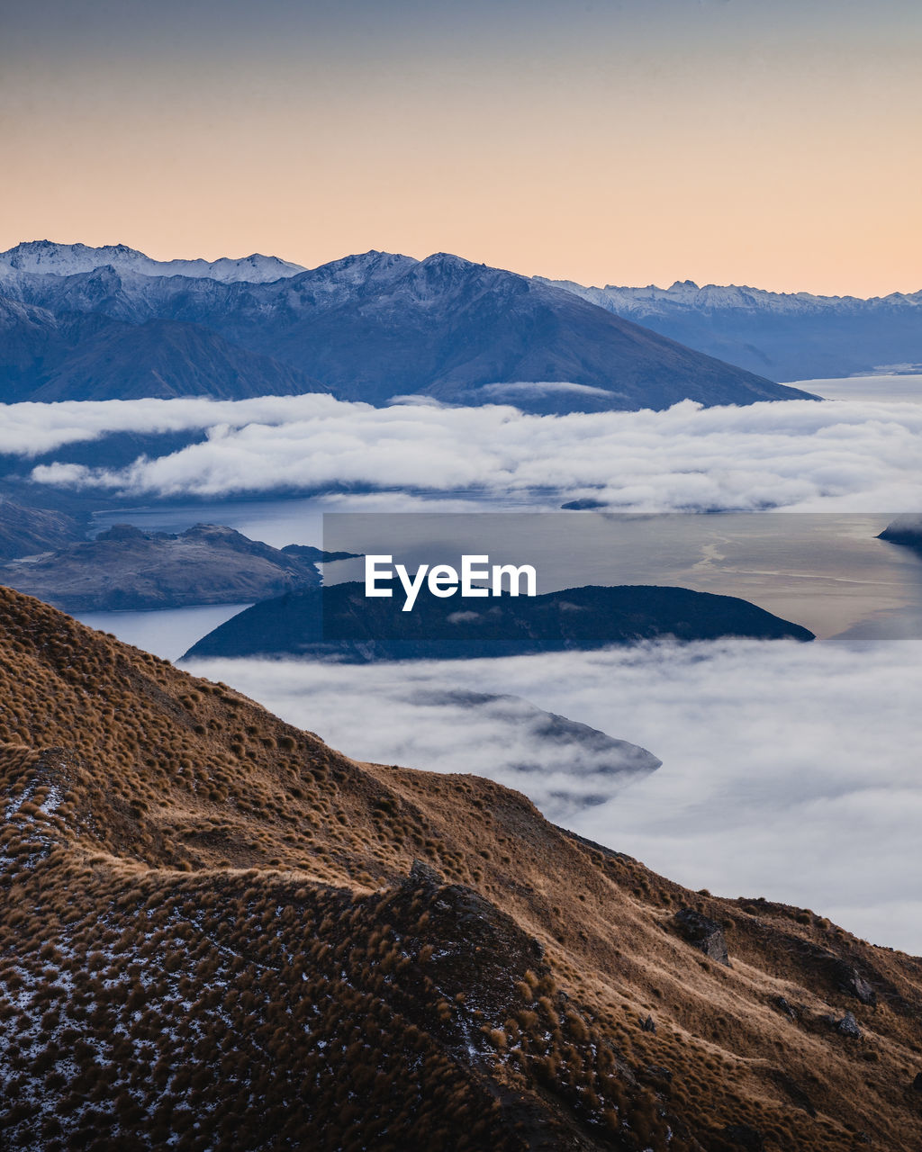 Scenic view of mountains against sky during sunset