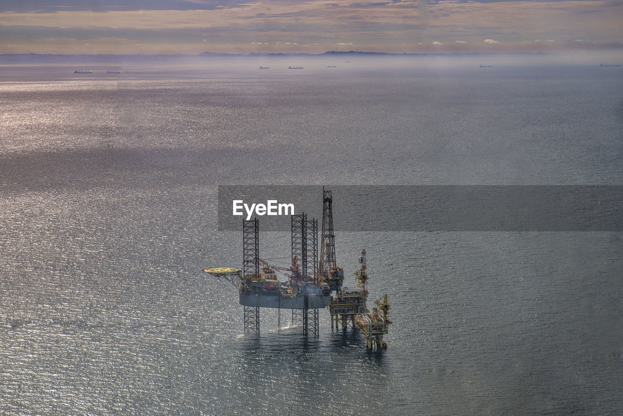 SMOKE STACKS IN SEA