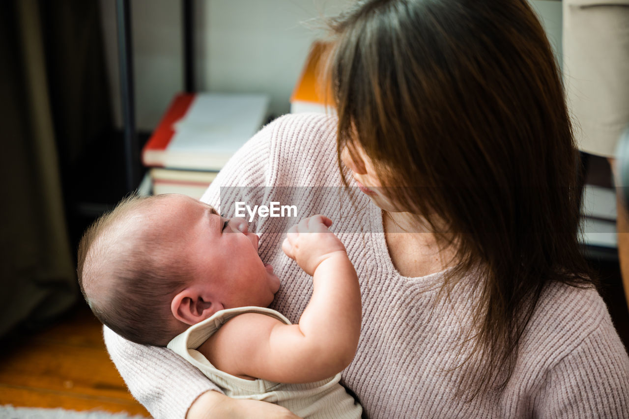 close-up of cute baby boy at home