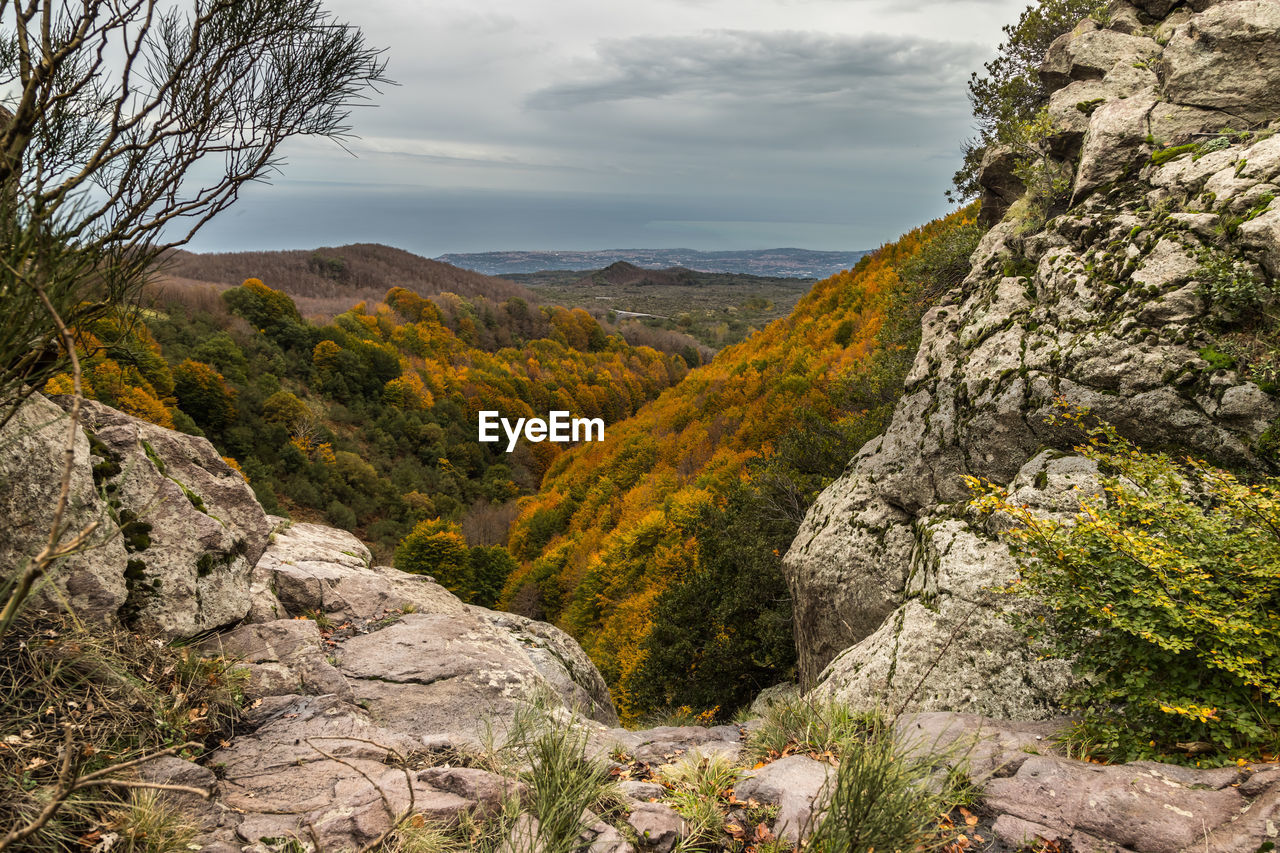 Scenic view of rocky mountains against sky