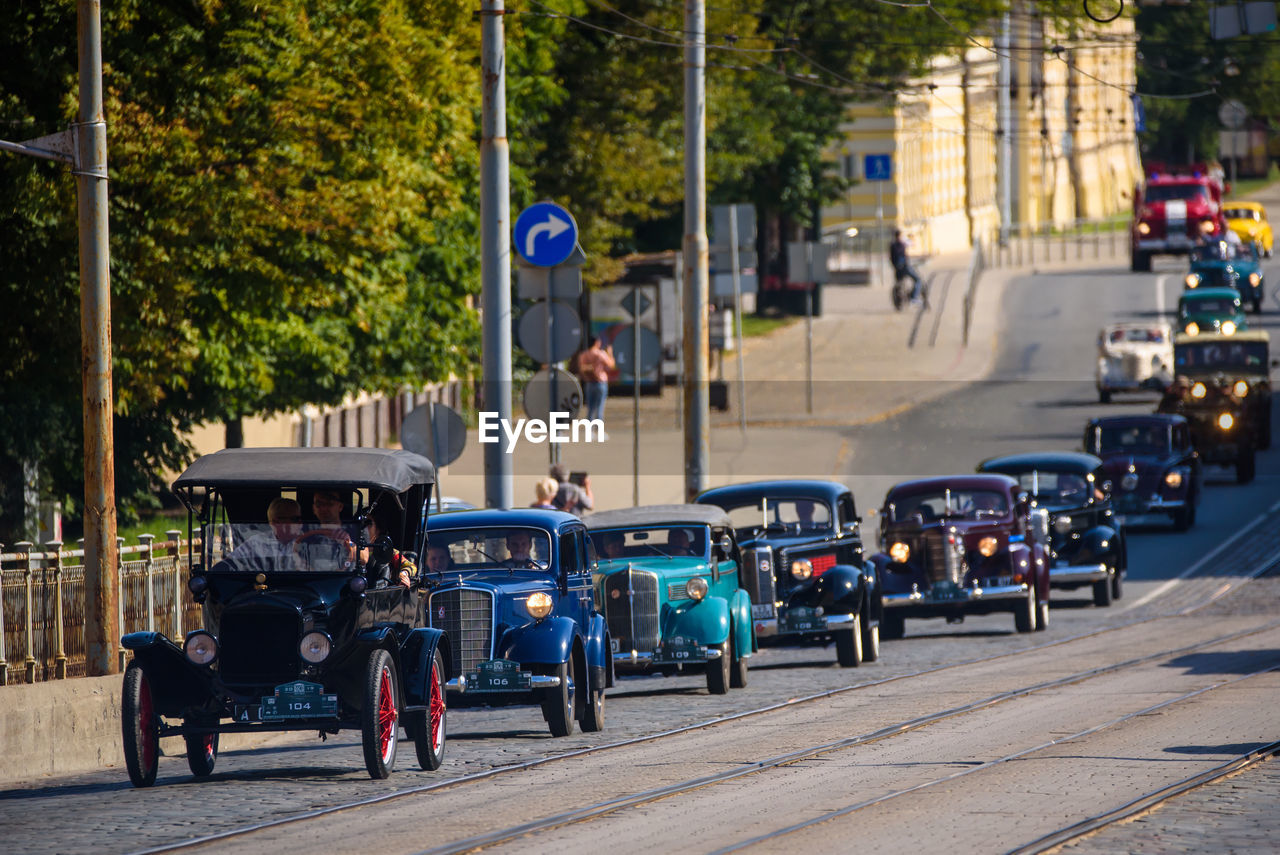 VEHICLES ON ROAD IN CITY