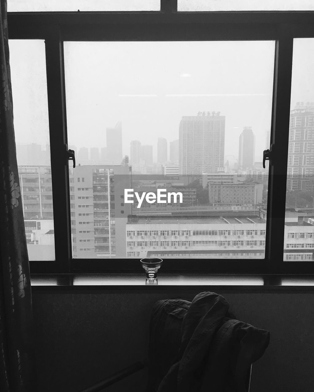 Cityscape seen through window