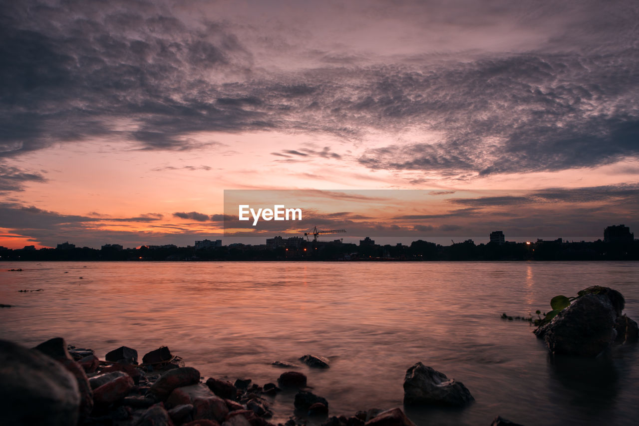 Scenic view of sea against sky during sunset