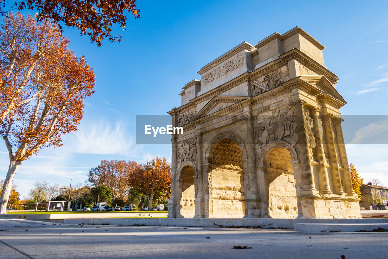 Famous roman triumphal arch, historical building in orange city, photography taken in france